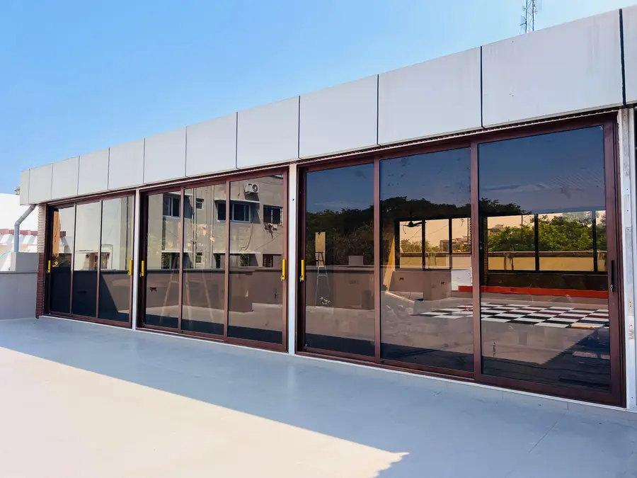 Aluminium sliding doors Chennai by Crystal Aluminium Systems